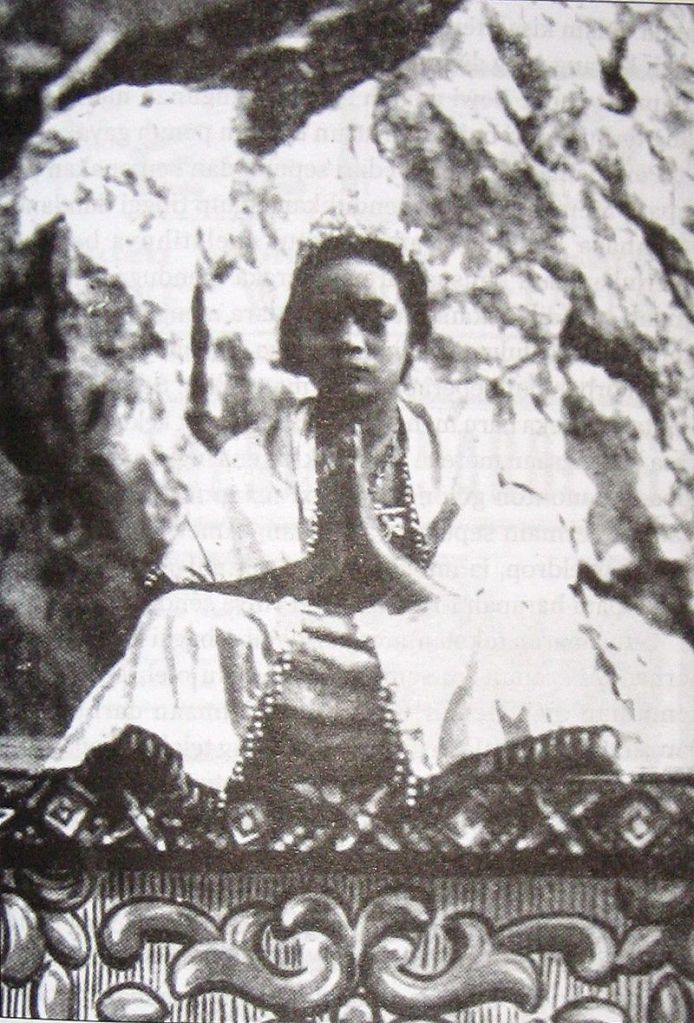 A promotional still showing one of the cast members, in costume