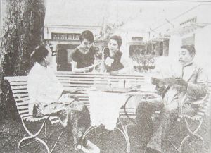 A film still of the film actors and set of Lily van Java.